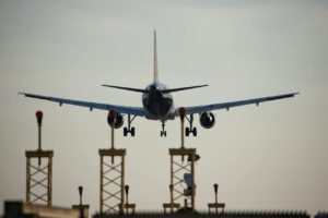 Landing pages - image of plane landing at an airport